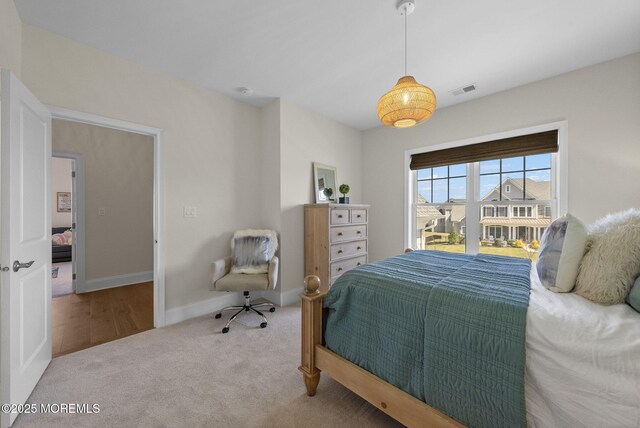 61 Windermere Rd, Lincroft, NJ 07738 - bedroom with baseboards, visible vents, and carpet