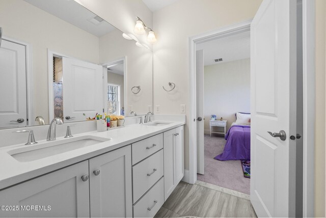 61 Windermere Rd, Lincroft, NJ 07738 - full bathroom featuring ensuite bathroom, visible vents, a sink, and double vanity