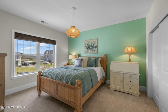 61 Windermere Rd, Lincroft, NJ 07738 - bedroom featuring baseboards, visible vents, a closet, and light carpet