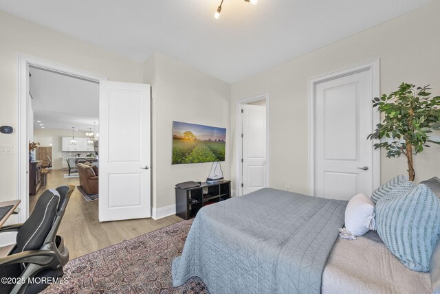 61 Windermere Rd, Lincroft, NJ 07738 - bedroom featuring light wood finished floors and baseboards
