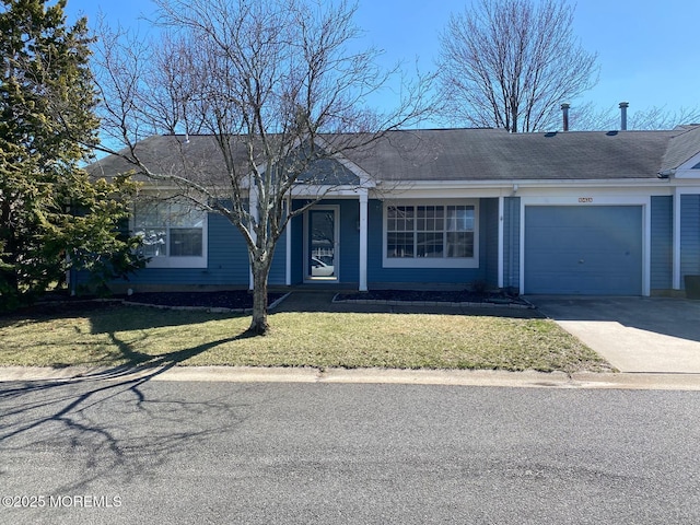 1042A Canterbury Dr, Manchester, NJ 08759 - single story home featuring a front yard, an attached garage, and concrete driveway