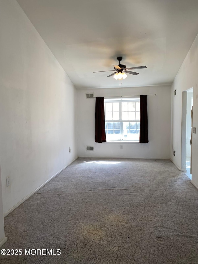 1042A Canterbury Dr, Manchester, NJ 08759 - carpeted empty room with a ceiling fan and visible vents