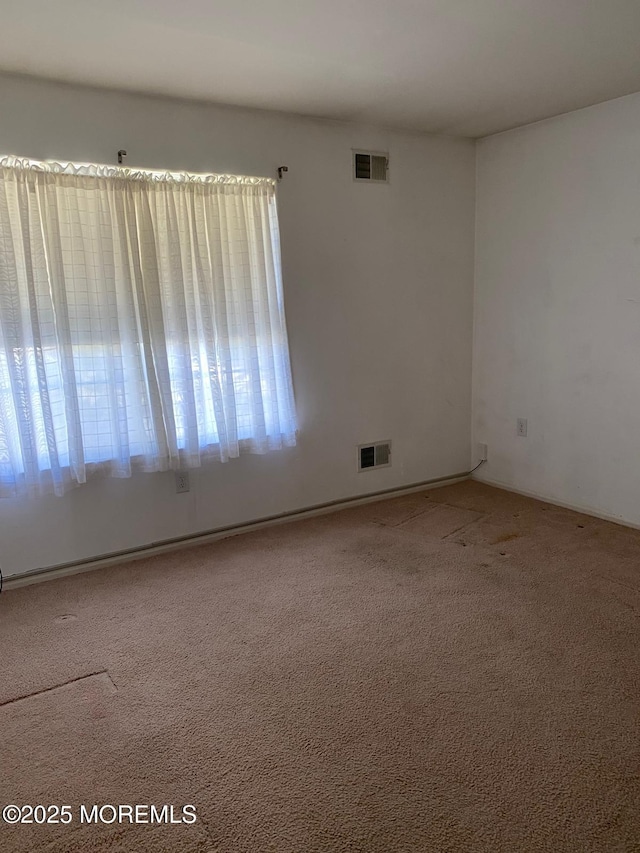 1042A Canterbury Dr, Manchester, NJ 08759 - carpeted empty room with visible vents