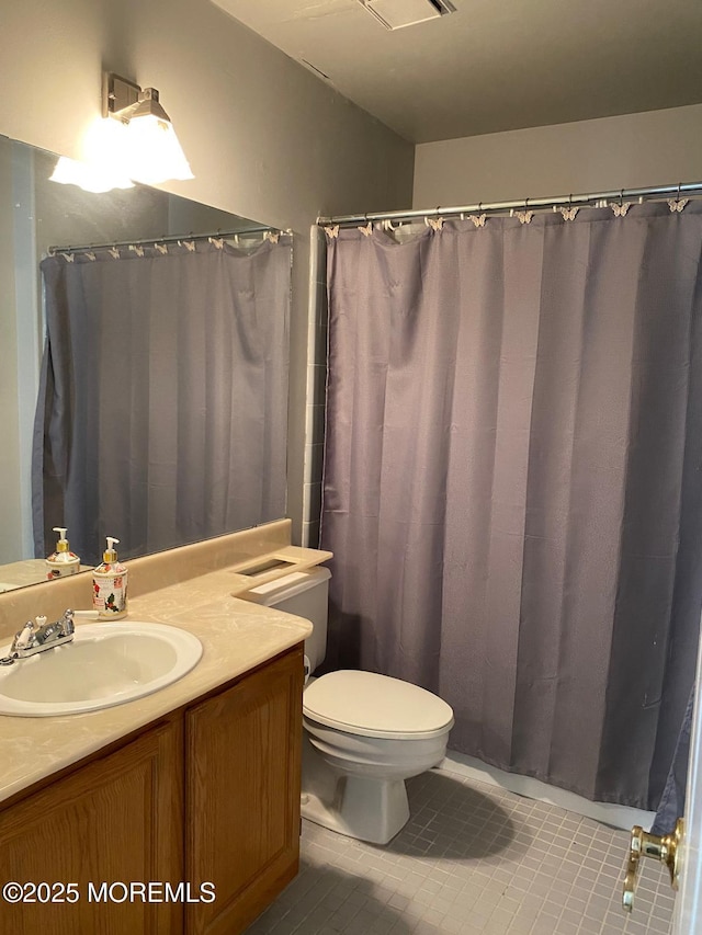 1042A Canterbury Dr, Manchester, NJ 08759 - full bath with toilet, tile patterned flooring, and vanity