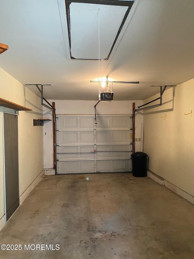 1042A Canterbury Dr, Manchester, NJ 08759 - garage featuring a garage door opener