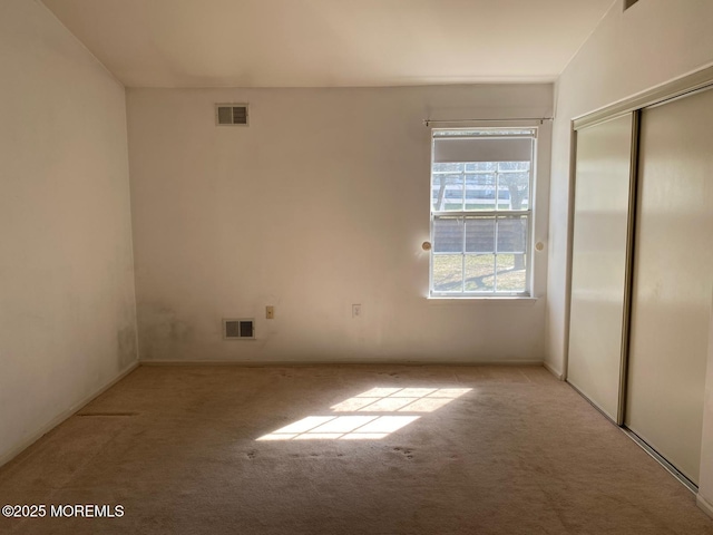 1042A Canterbury Dr, Manchester, NJ 08759 - unfurnished bedroom featuring visible vents, a closet, and carpet floors