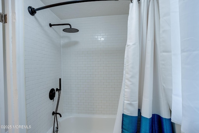 full bathroom featuring shower / bath combo with shower curtain