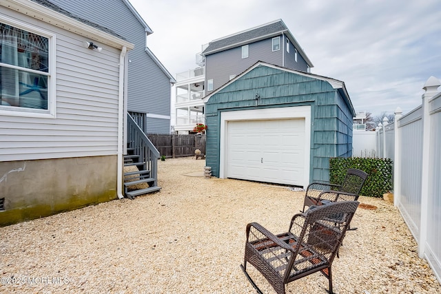 garage with fence