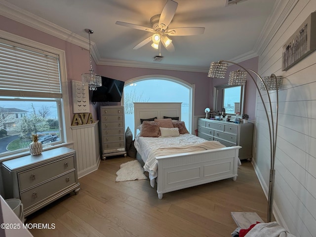 300 W Concourse, Neptune Township, NJ 07753 - bedroom featuring light wood finished floors, visible vents, ornamental molding, and ceiling fan