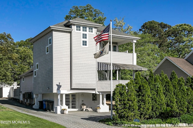 20 River Ave, Island Heights, NJ 08732 - back of property featuring a balcony, a patio, and french doors