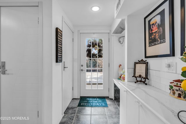 entryway featuring tile patterned floors