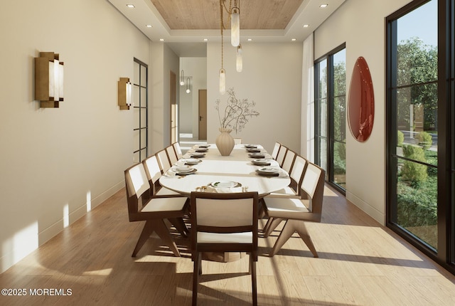 721 Corlies Ave, Allenhurst, NJ 07711 - dining space featuring a tray ceiling, wood finished floors, and recessed lighting