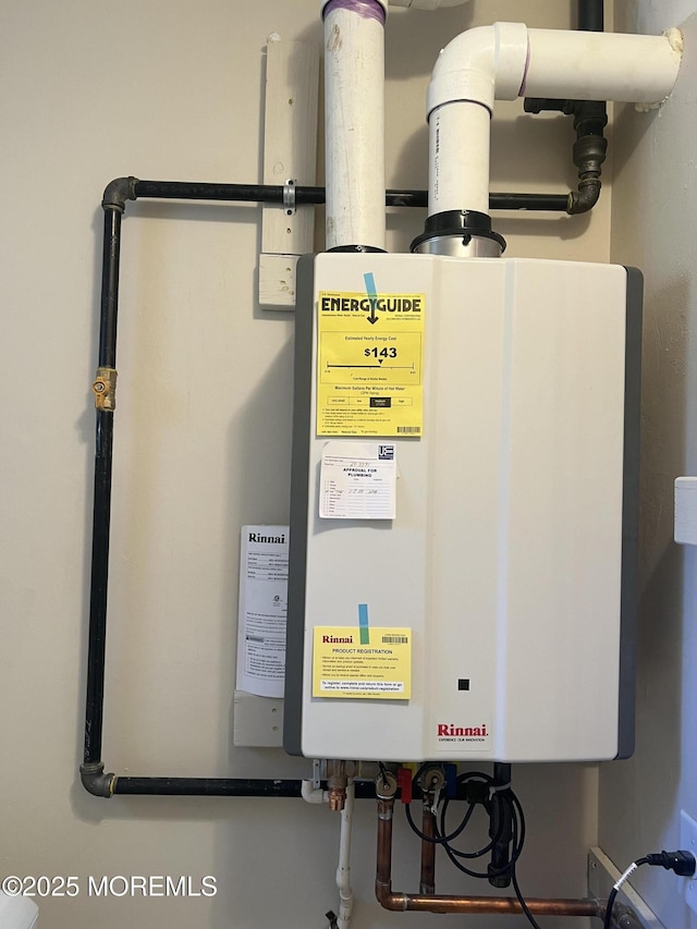 49 Watkins Rd, Brick, NJ 08724 - utility room featuring tankless water heater