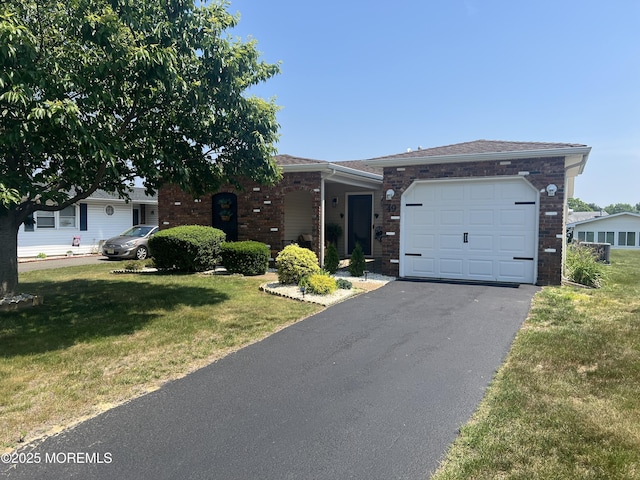 49 Watkins Rd, Brick, NJ 08724 - ranch-style house with a garage, a front lawn, driveway, and brick siding