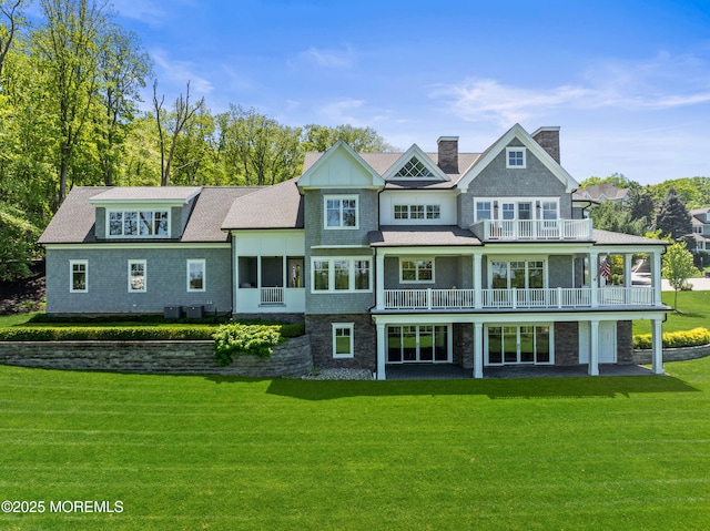11 Beacon Hill Rd, Atlantic Highlands, NJ 07716 - rear view of property featuring a balcony, a lawn, a chimney, and central air condition unit