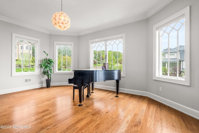 11 Beacon Hill Rd, Atlantic Highlands, NJ 07716 - living area featuring crown molding, light wood finished floors, and baseboards