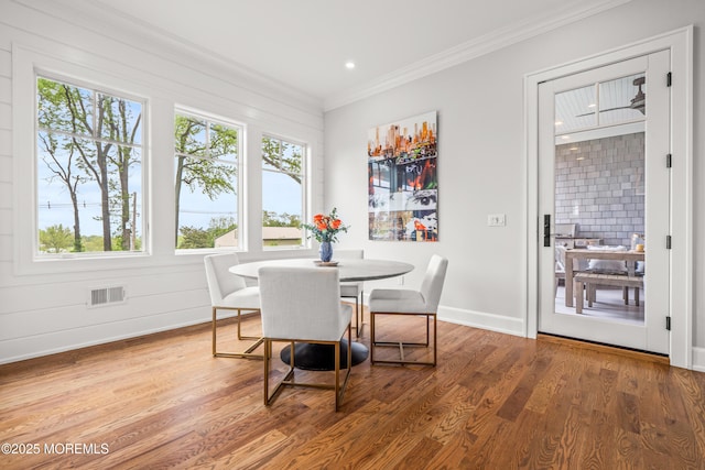 11 Beacon Hill Rd, Atlantic Highlands, NJ 07716 - dining area featuring plenty of natural light, ornamental molding, wood finished floors, baseboards, and recessed lighting