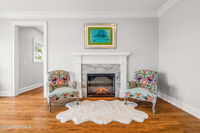 11 Beacon Hill Rd, Atlantic Highlands, NJ 07716 - living area featuring a premium fireplace, crown molding, baseboards, and wood finished floors
