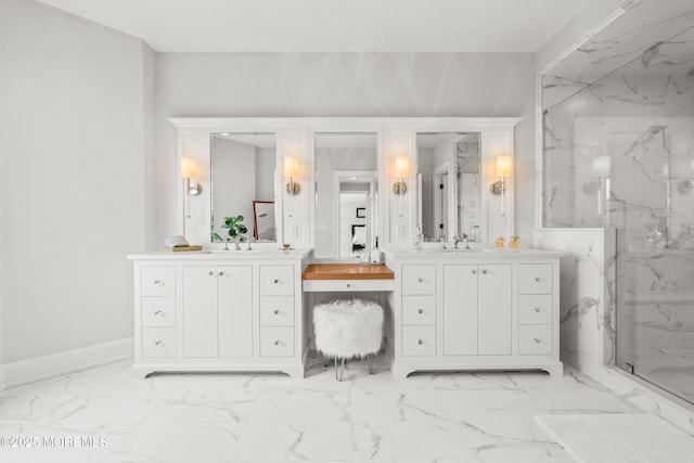 11 Beacon Hill Rd, Atlantic Highlands, NJ 07716 - bathroom with marble look tile flooring, a marble finish shower, two vanities, and baseboards