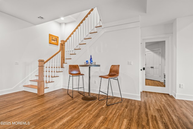 11 Beacon Hill Rd, Atlantic Highlands, NJ 07716 - stairs featuring wood finished floors and baseboards