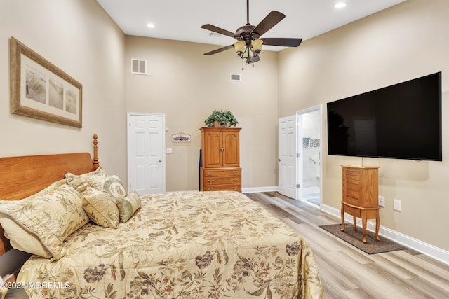 1792 Buttonwood Ave, Toms River, NJ 08755 - bedroom with visible vents, baseboards, high vaulted ceiling, and wood finished floors