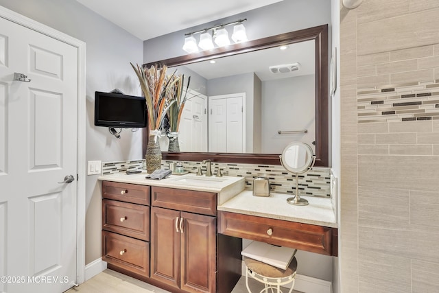 1792 Buttonwood Ave, Toms River, NJ 08755 - bathroom with vanity, decorative backsplash, and visible vents