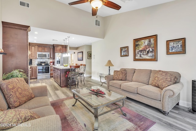 1792 Buttonwood Ave, Toms River, NJ 08755 - living room with light wood-style flooring, visible vents, and baseboards