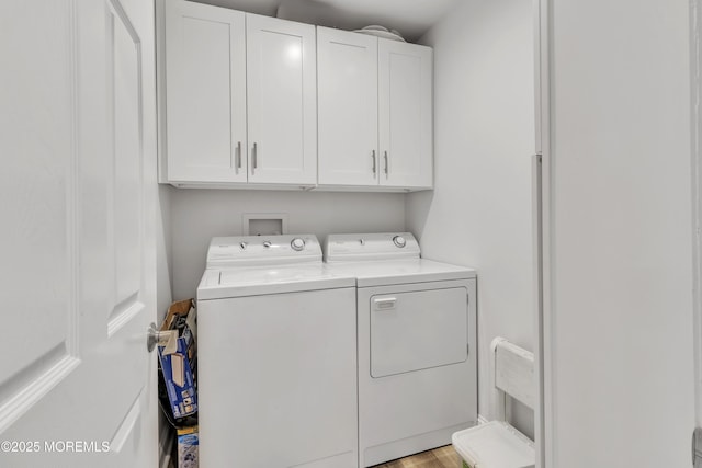 1792 Buttonwood Ave, Toms River, NJ 08755 - washroom with light wood finished floors, separate washer and dryer, and cabinet space