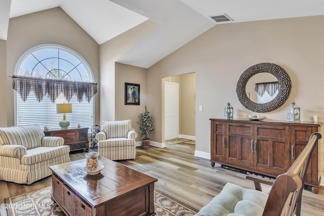1792 Buttonwood Ave, Toms River, NJ 08755 - living area with visible vents, high vaulted ceiling, and light wood-style floors