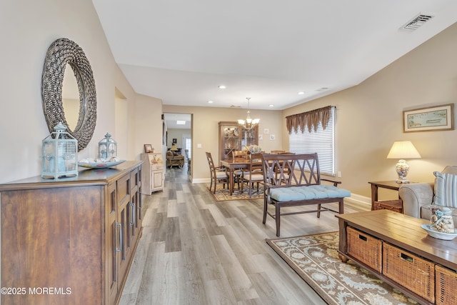 1792 Buttonwood Ave, Toms River, NJ 08755 - living room with visible vents, baseboards, light wood-type flooring, and a notable chandelier