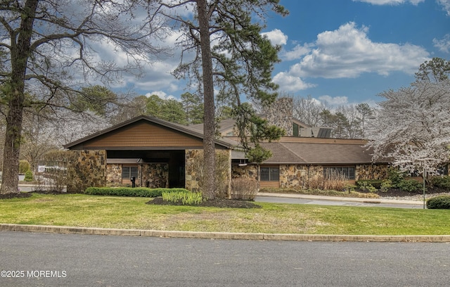 1792 Buttonwood Ave, Toms River, NJ 08755 - view of front facade featuring a front yard and stone siding