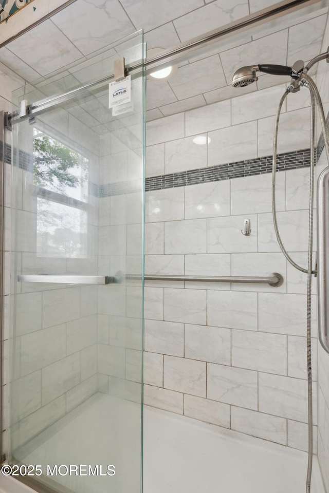 full bathroom with a stall shower