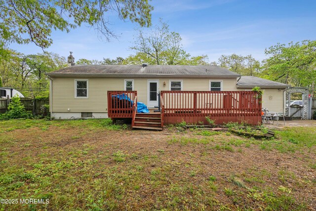 rear view of property with a deck
