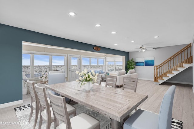dining room with recessed lighting, light wood finished floors, stairway, ceiling fan, and baseboards