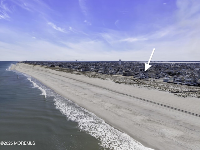 property view of water featuring a beach view