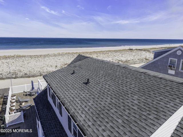 aerial view featuring a beach view and a water view