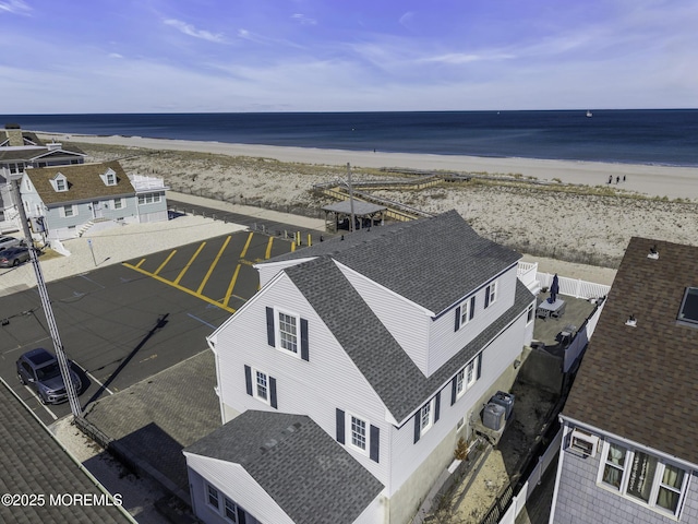 aerial view featuring a beach view and a water view