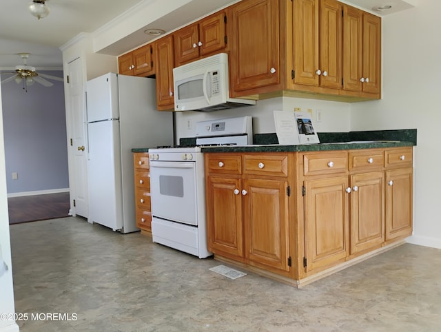 53 Pine Ridge Blvd, Whiting, NJ 08759 - kitchen featuring white appliances, ceiling fan, light floors, and brown cabinetry