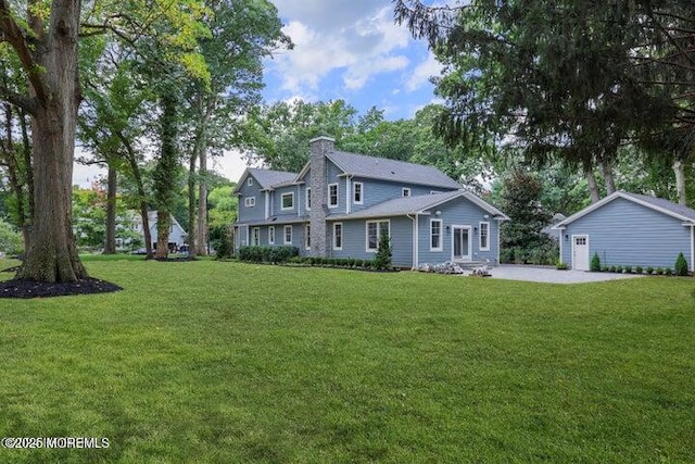 40 Circle Dr, Rumson, NJ 07760 - view of front of home with a chimney and a front lawn