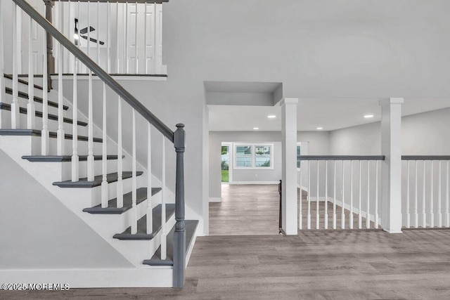 703 Stone Rd, Union Beach, NJ 07735 - stairway featuring wood finished floors, recessed lighting, and baseboards