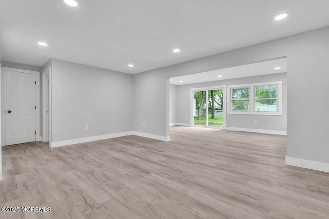 703 Stone Rd, Union Beach, NJ 07735 - empty room with recessed lighting, light wood-style flooring, and baseboards