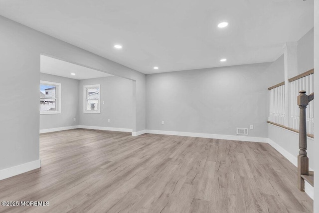 703 Stone Rd, Union Beach, NJ 07735 - unfurnished living room with wood finished floors, recessed lighting, and baseboards