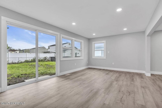 703 Stone Rd, Union Beach, NJ 07735 - unfurnished room featuring wood finished floors, baseboards, and recessed lighting