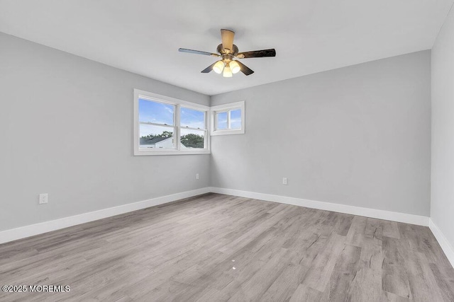 703 Stone Rd, Union Beach, NJ 07735 - empty room featuring a ceiling fan, baseboards, and wood finished floors