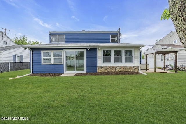 703 Stone Rd, Union Beach, NJ 07735 - rear view of house with a gazebo and a patio area
