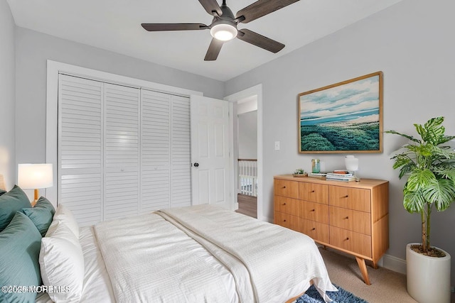 703 Stone Rd, Union Beach, NJ 07735 - bedroom featuring a closet, baseboards, carpet, and a ceiling fan