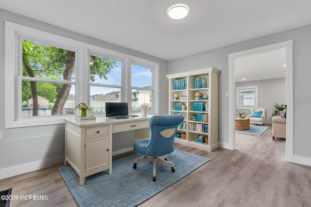 703 Stone Rd, Union Beach, NJ 07735 - office space featuring healthy amount of natural light, baseboards, and light wood-style floors