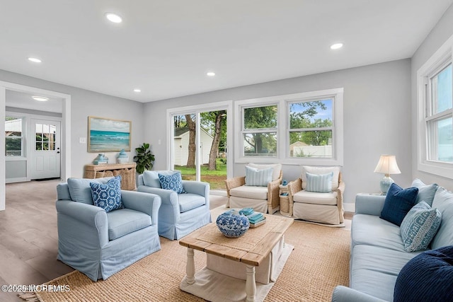 703 Stone Rd, Union Beach, NJ 07735 - living room with recessed lighting, plenty of natural light, and light wood-type flooring