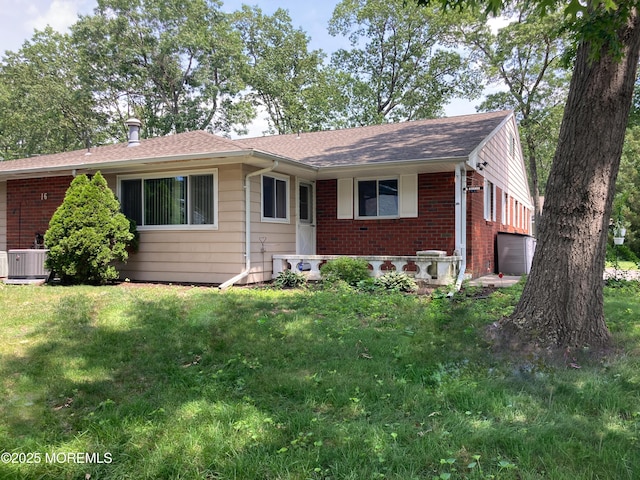 16A Lark St Unit A, Manchester, NJ 08759 - ranch-style house featuring brick siding, a front yard, a shingled roof, and a garage