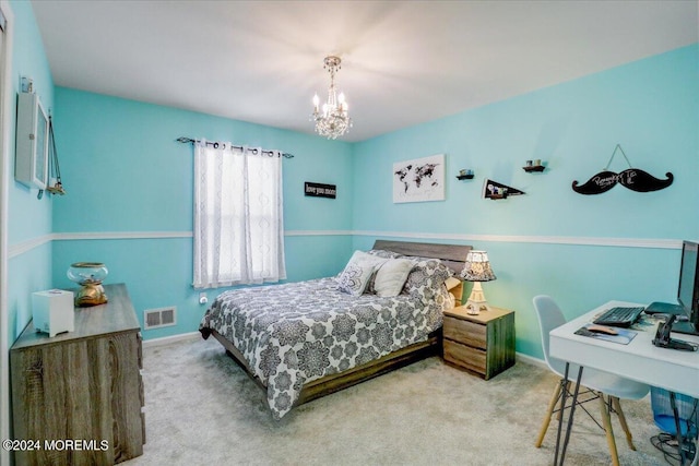 bedroom featuring baseboards, visible vents, a notable chandelier, and carpet floors